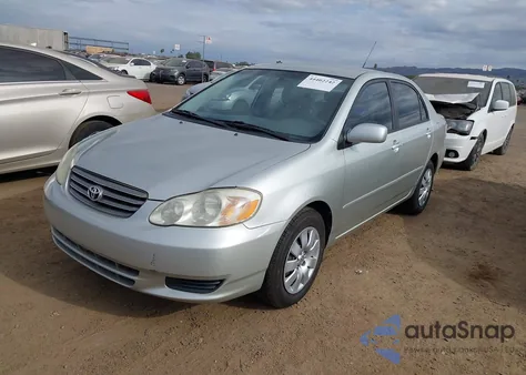2004 Toyota Corolla Le z USA, uszkodzony, nr VIN JTDBR32E642043194